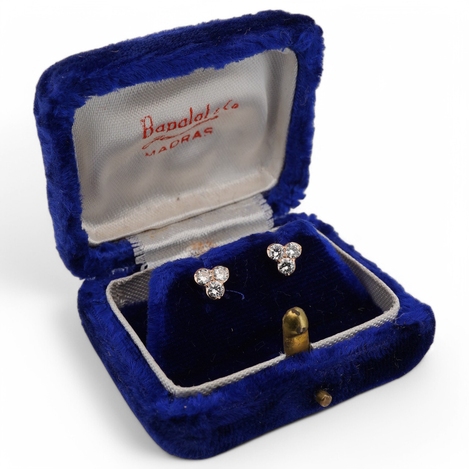 A par of 14k and three stone diamond cluster set ear studs, with a total diamond weight of approximately 0.90ct, gross weight 1.5 grams. Condition - good